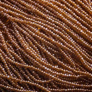 Czech Seed Bead 13/0 Cut Transparent Dark Topaz Luster